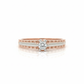 Classic Solitaire Harmony Ring: Crafted in 18k rose gold with a sleek rhodium band