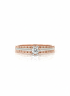 Classic Solitaire Harmony Ring: Crafted in 18k rose gold with a sleek rhodium band