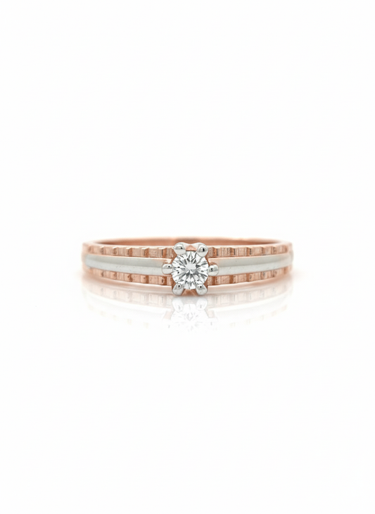 Classic Solitaire Harmony Ring: Crafted in 18k rose gold with a sleek rhodium band