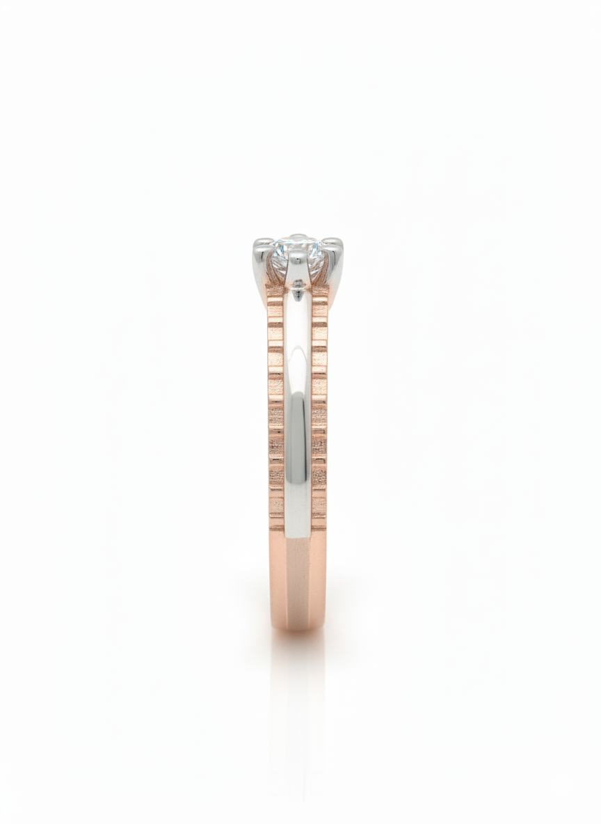 Classic Solitaire Harmony Ring: Crafted in 18k rose gold with a sleek rhodium band
